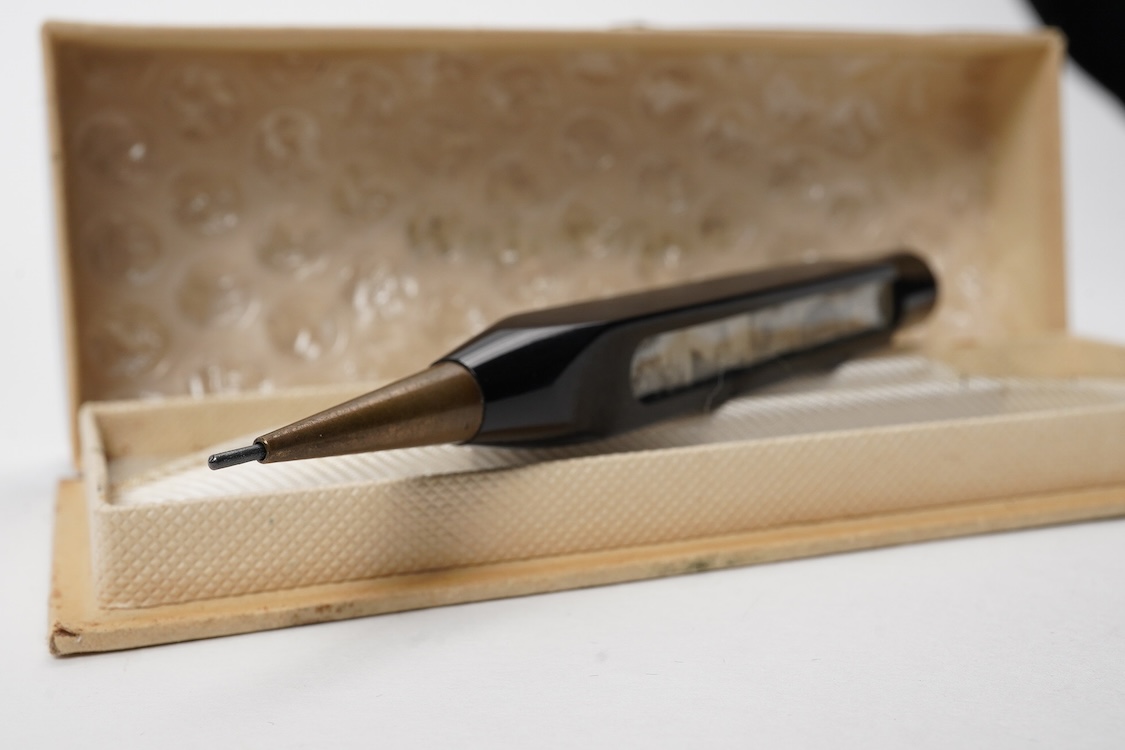 A propelling pencil inset with pictures of famous buildings in Waterman box